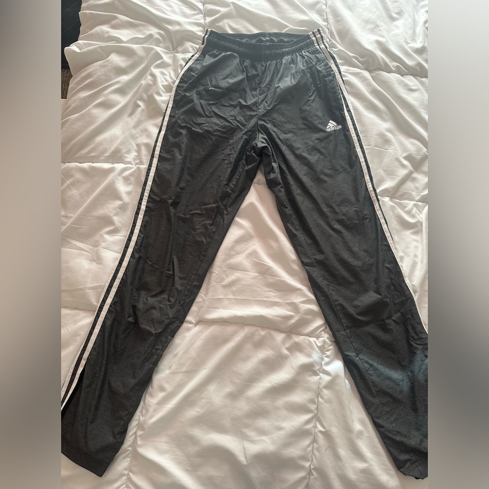 Gray Adidas trackpants ￼